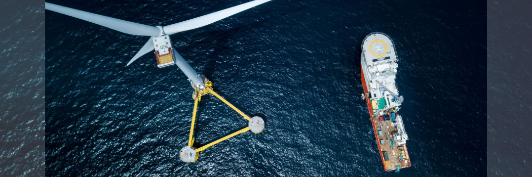 Main image shows an aerial view of the Dock90 wind farm, with a ship alongside. Image credit: Principle Power