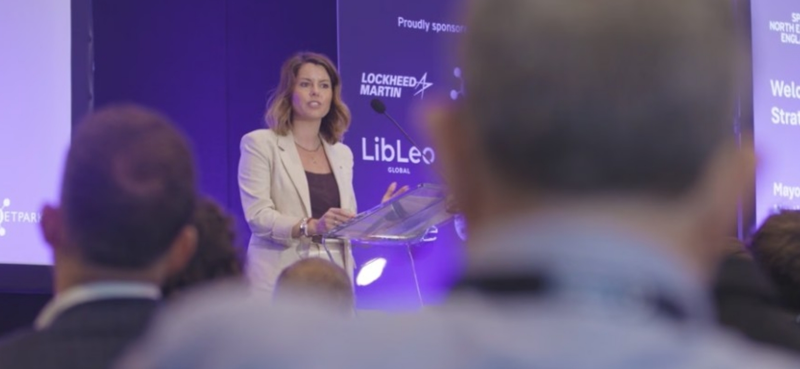 A woman giving a presentation